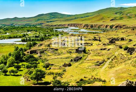 Uplistsikhe on a bank of the Kura river, an ancient rock-hewn town in Georgia Stock Photo