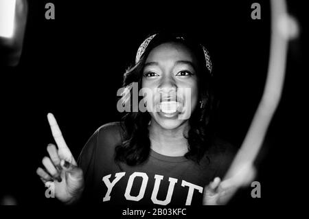 British female rapper Little Simz (real name Simbiatu Abisola Abiola Ajikawo) performing at the piano during the video shoot for Leave It As That. Stock Photo