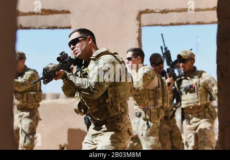 U.S. Air Force commandos with the 409th Expeditionary Security Forces Squadron Response Force, conduct building clearing procedures during a close quarters battle refresher course at Nigerian Air Base 201 February 5, 2020 in Agadez, Niger. Stock Photo