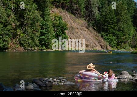 People hanging out on the North Santiam River, Oregon Stock Photo