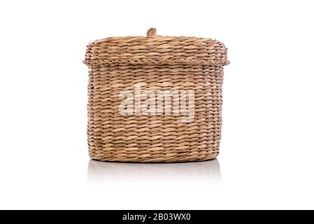 Wicker basket is isolated on a white background. Stock Photo