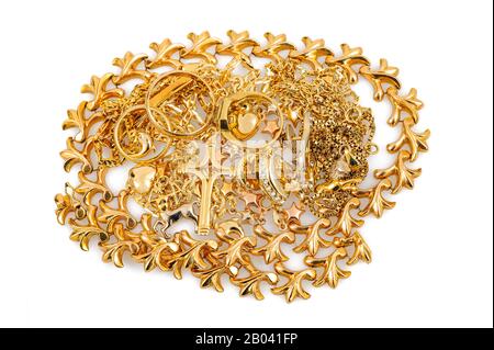 gold jewelry pile isolated on white background Stock Photo