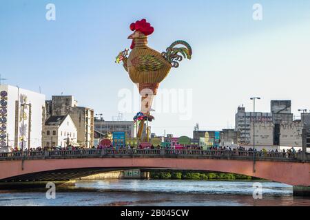 Recife / Pernambuco / Brazil. February, 11, 2018. Street carnival in the center of Recife with the giant puppet of the block “Galo da Madrugada”. Stock Photo