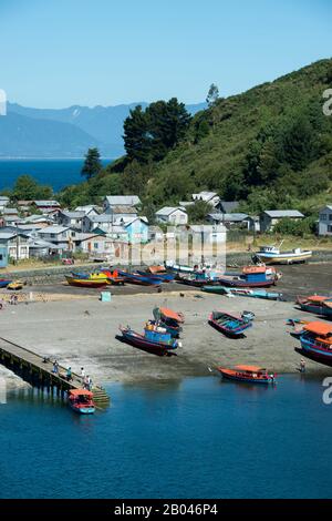 View of colorful fishing boats in Puerto Montt in southern Chile. Stock Photo