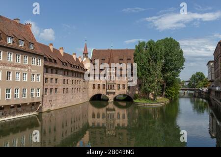 View of Kreuzigungshof and the Pegnitz river from Museumsbrücke in Nuremberg, Bavaria, Germany. Stock Photo