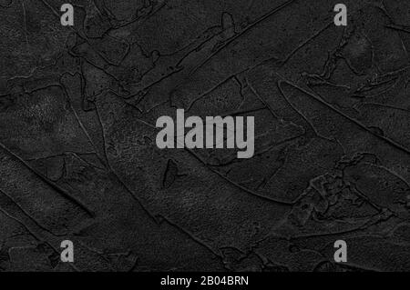 Black concrete wall textured for background. Copy space. Close up. Stock Photo