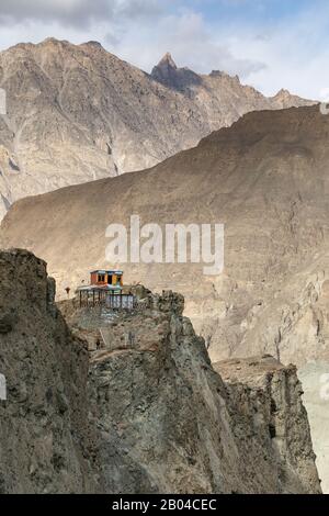 Building on the top of the rock in deserted mountains near Hoper glacier Hunza valley Pakistan Northern areas Stock Photo