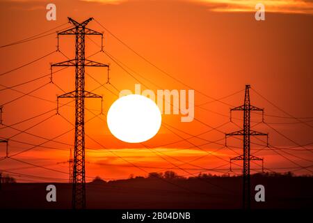 Silhouette of Power Lines during Sunset Stock Photo - Alamy