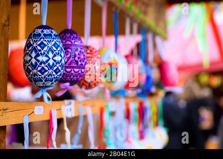 Beautifully decorated easter eggs hanging in a row Stock Photo