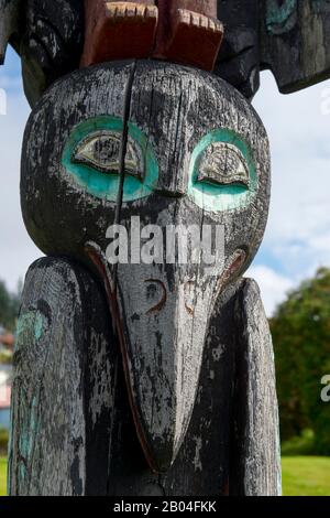 Detail of raven on a Tlingit totem pole in front of post office in ...