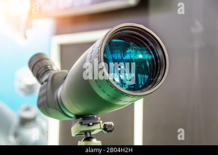 Digital night green vision scope. Monocular lens Stock Photo