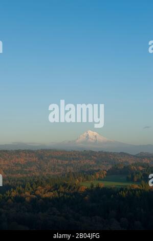 View in the fall from Jonsrud Viewpoint of the Sandy River valley, the Cascade Mountains and Mt. Hood near Sandy in Oregon, USA. Stock Photo