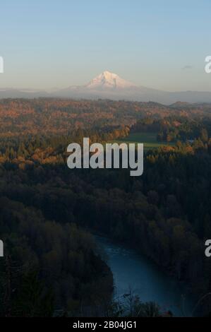 View in the fall from Jonsrud Viewpoint of the Sandy River valley, the Cascade Mountains and Mt. Hood near Sandy in Oregon, USA. Stock Photo