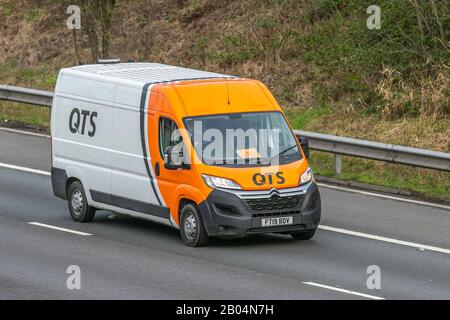 QTS Group van; UK's leading Rail Contractor; Haulage delivery trucks, HGV lorry, transportation, truck, vehicle, transport industry, M61 at Manchester, UK Stock Photo