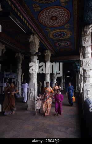 Pilgrims at the Meenakshi Amman Temple, which is a historic Hindu temple built in 1560 and located on the southern bank of the Vaigai River in the tem Stock Photo