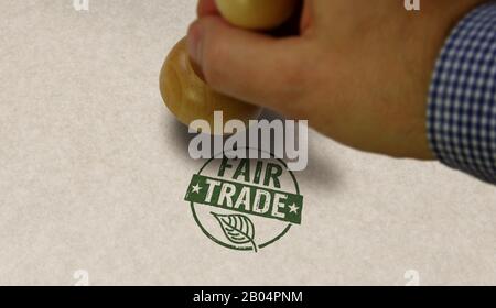 Fair Trade stamp and stamping hand. Ethical business, green trade, sustainable economy and environmental care  concept.