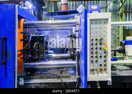 old horizontal die cast aluminium machine - opened, close-up with selective focus Stock Photo