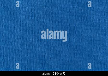 Flat lay a classic blue fabric. Abstract modern trendy cloth texture background Stock Photo