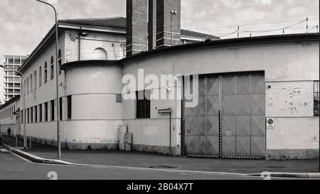 Old-fashioned factory in Orobia street, southern suburbs of Milan, Italy. This building was also photographed by ph. G. Basilico in 1978 Stock Photo