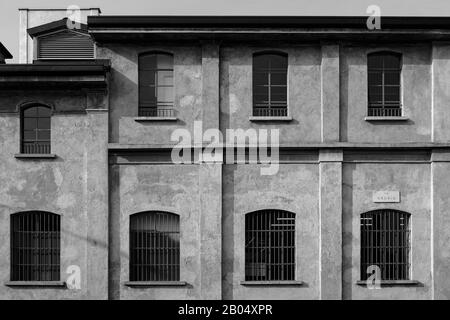 Old-fashioned factory shed at Prada Foundation in Orobia street in the southern suburbs of Milan, Italy Stock Photo