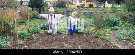 Scarecrows in a garden, Northern Black Forest Region, Baden-Wurttemberg, Germany Stock Photo