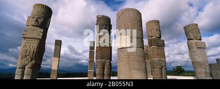 Low angle view of clouds over statues, Atlantes Statues, Temple of Quetzalcoatl, Tula, Hidalgo State, Mexico Stock Photo