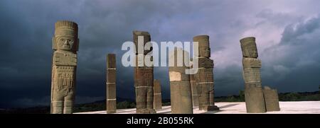 Low angle view of clouds over statues, Atlantes Statues, Temple of Quetzalcoatl, Tula, Hidalgo State, Mexico Stock Photo