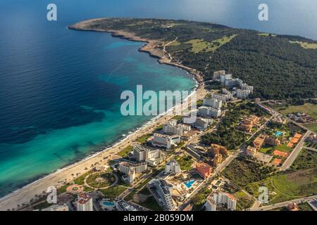 Aerial view, hotel complexes on the beach Cala Millor, Cala Millor headland, Son Moro, Sant Llorenç des Cardassar, Son Servera, Balearic Islands, Spai Stock Photo