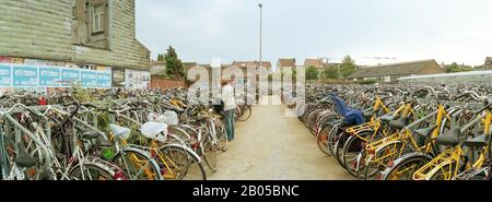 Bicycles parked in the parking lot of a railway station, Gent-Sint-Pieters, Ghent, East Flanders, Flemish Region, Belgium Stock Photo