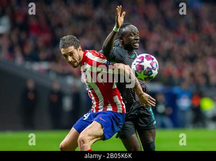 Atletico de Madrid's Sime Vrsaljko and Liverpool's FC Sadio Mane are seen in action during the UEFA Champions League match, round of 16 first leg between Atletico de  Madrid and Liverpool FC at Wanda Metropolitano Stadium in Madrid.(Final score; Atletico de Madrid 1:0 Liverpool FC) Stock Photo