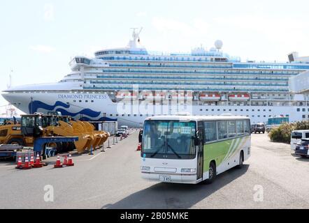 Yokohama, Japan. 18th Feb, 2020. A bus leaves from a cruise ship Diamond Princess at the Daikoku pier in Yokohama, sububan Tokyo on Tuesday, February 18, 2020. 88 more people on the Diamond Princess have tested positive for the new coronavirus COVID-19 on February 18, total 542 passengers and crews have found at the ship. Credit: Yoshio Tsunoda/AFLO/Alamy Live News Stock Photo