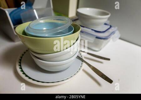 Dishes and bowls in kitchen Stock Photo
