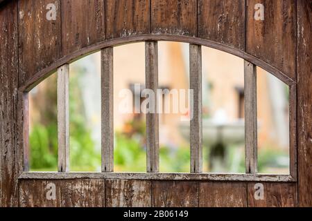 Mission Bars on Door Prison Gate Steel and Wood Old Vintage Stock Photo
