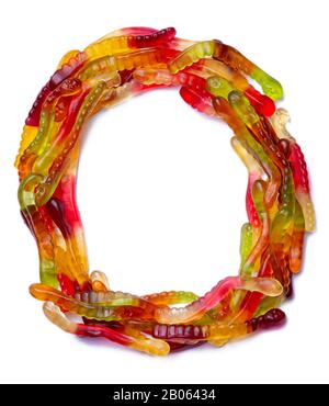 Letter O of the English alphabet  from multi-colored chewing marmalade on a white isolated background. Food pattern made ffrom children's sweets snake Stock Photo