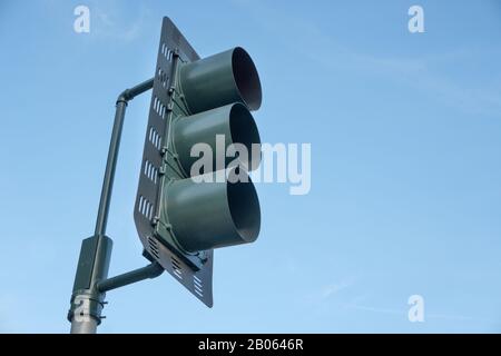 Traffic Light with Blue Sky in Urban City Stock Photo