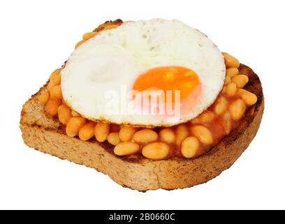 Fried egg and baked beans with tomato sauce on toast isolated on a white background Stock Photo