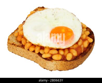 Fried egg and baked beans with tomato sauce on toast isolated on a white background Stock Photo