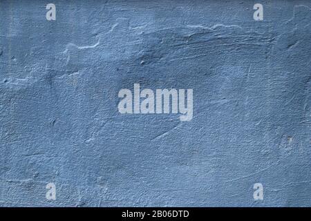 Blue and gray concrete texture, rough painted background, urban cement wall, stucco. Grunge architecture backdrop. Uneven solid surface Stock Photo