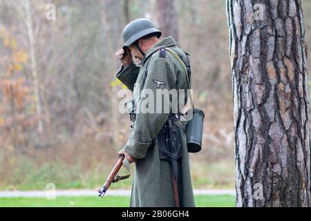 Vorzel, Ukraine - November 03, 2019: Men in the form of Wehrmacht soldiers at the festival of historical reconstruction Stock Photo