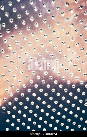 Abstract dark background with shining round dots. Stock Photo
