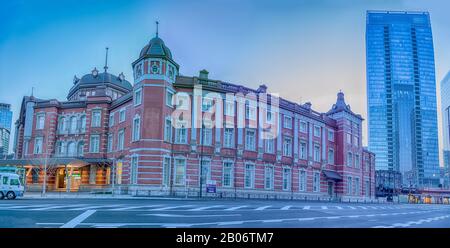 Tokyo, Japan - Jan 03, 2018 : View of the building Tokyo Station in Tokyo Japan. This is main station of train system in Tokyo Tokyo with the skyscrap Stock Photo