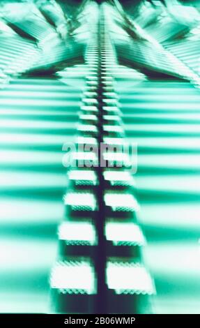 Motion blurred green abstract futuristic background. Stock Photo