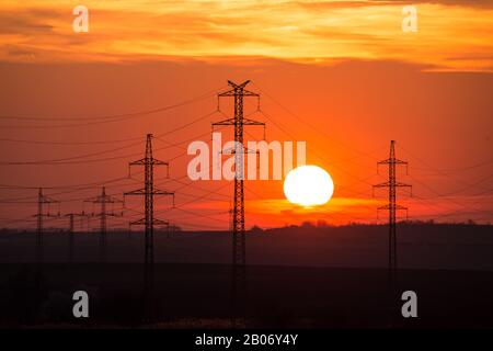 Power Line Silhouette During Sunset Stock Photo - Alamy