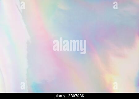 Holographic textures. Glitter foil and metal rainbow gradient background Stock Photo