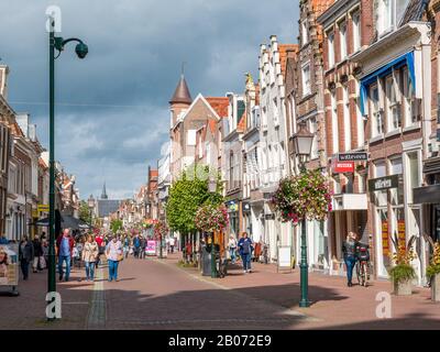 People in shopping street Grote Noord in downtown Hoorn, Noord-Holland, Netherlands Stock Photo