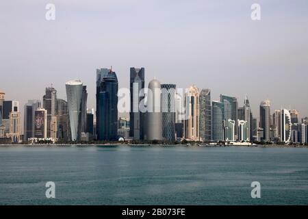 Doha / Qatar – February 18, 2020: View of the towers of the West Bay area of Doha, the city’s main business district Stock Photo