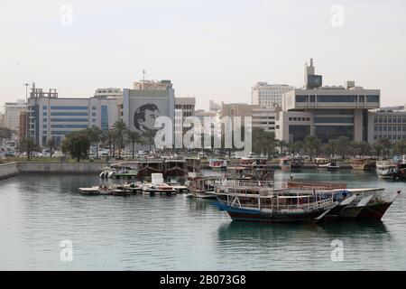 Doha / Qatar – February 18, 2020: Traditional dhows moored up by Doha corniche Stock Photo