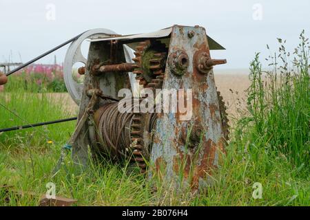 Old boat winch on Aldeburgh beach, Aldeburgh, Suffolk. UK Stock Photo
