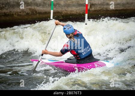 GB Canoe Slalom Athlete crossing white water in the women's C1W class. Stock Photo