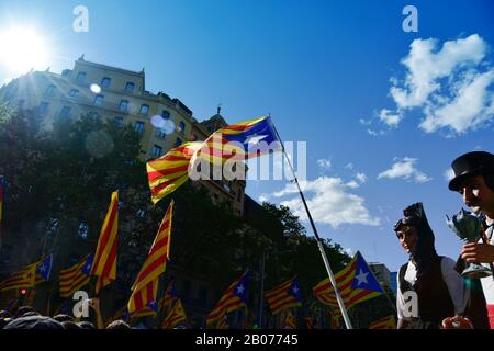 BARCELONA, SPAIN - SEPTEMBER 11, 2017: People in the Passeig de Gracia, in Barcelona, Spain, partaking in the rally in support for the independence of Stock Photo